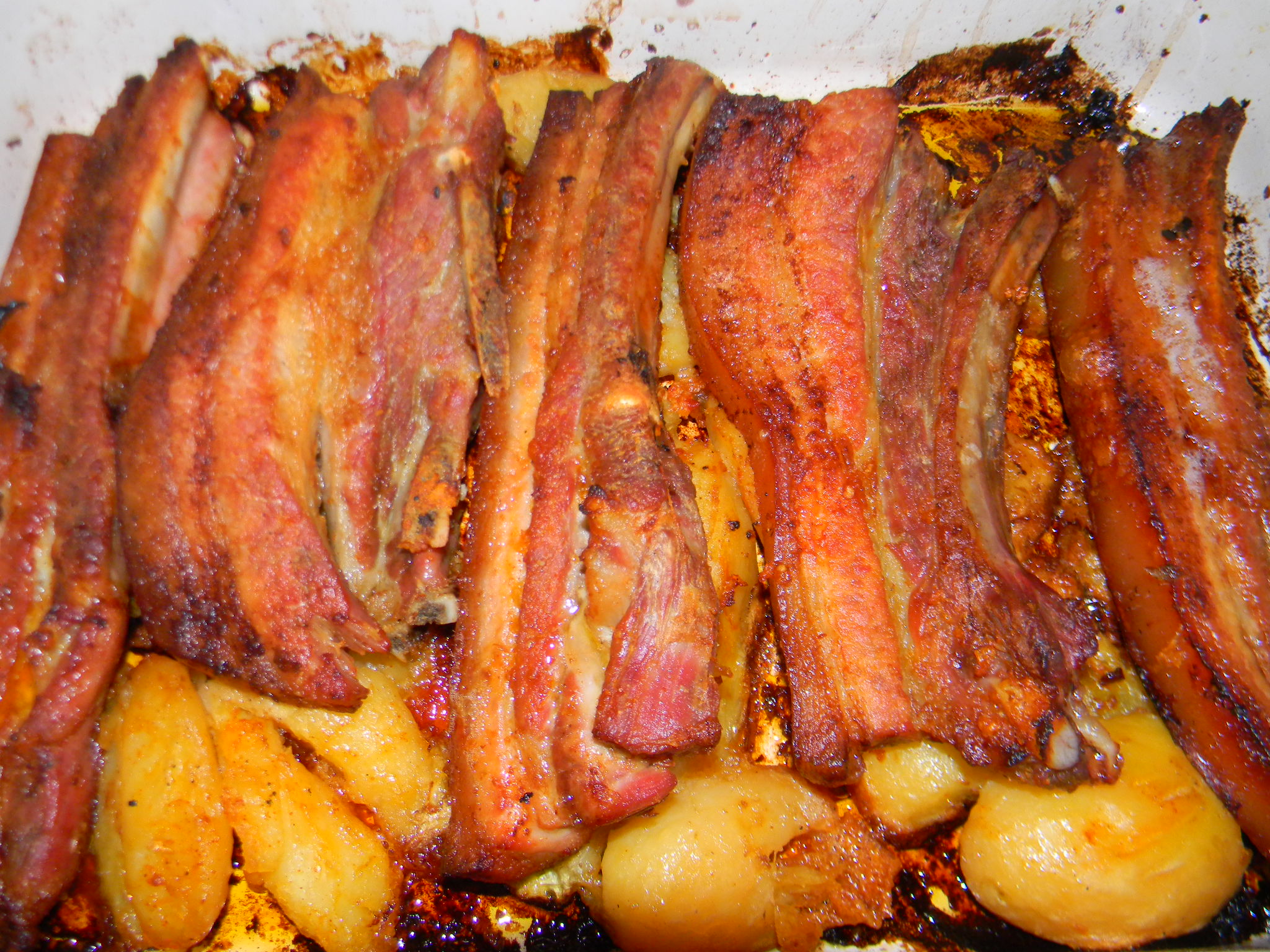 Fleica de porc cu cartofi la tava reteta gustoasa de friptura